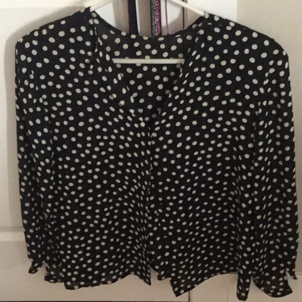 An Augustus blouse. Pure silk. Hidden buttons